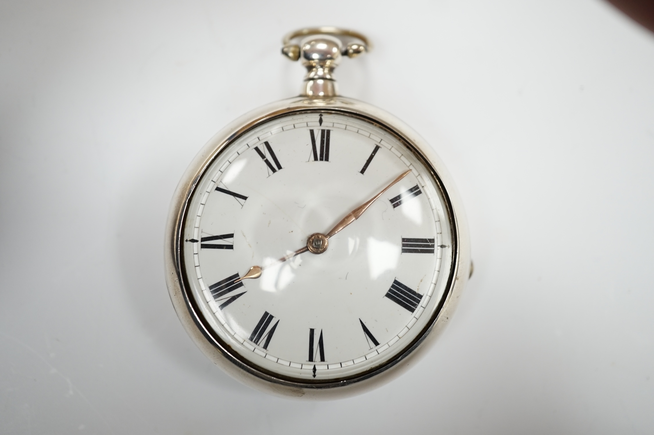 A George III silver pair cased keywind verge pocket watch, by W, Atwood of Lewes, with Roman dial and signed movement numbered 4644, outer case diameter 56mm.
